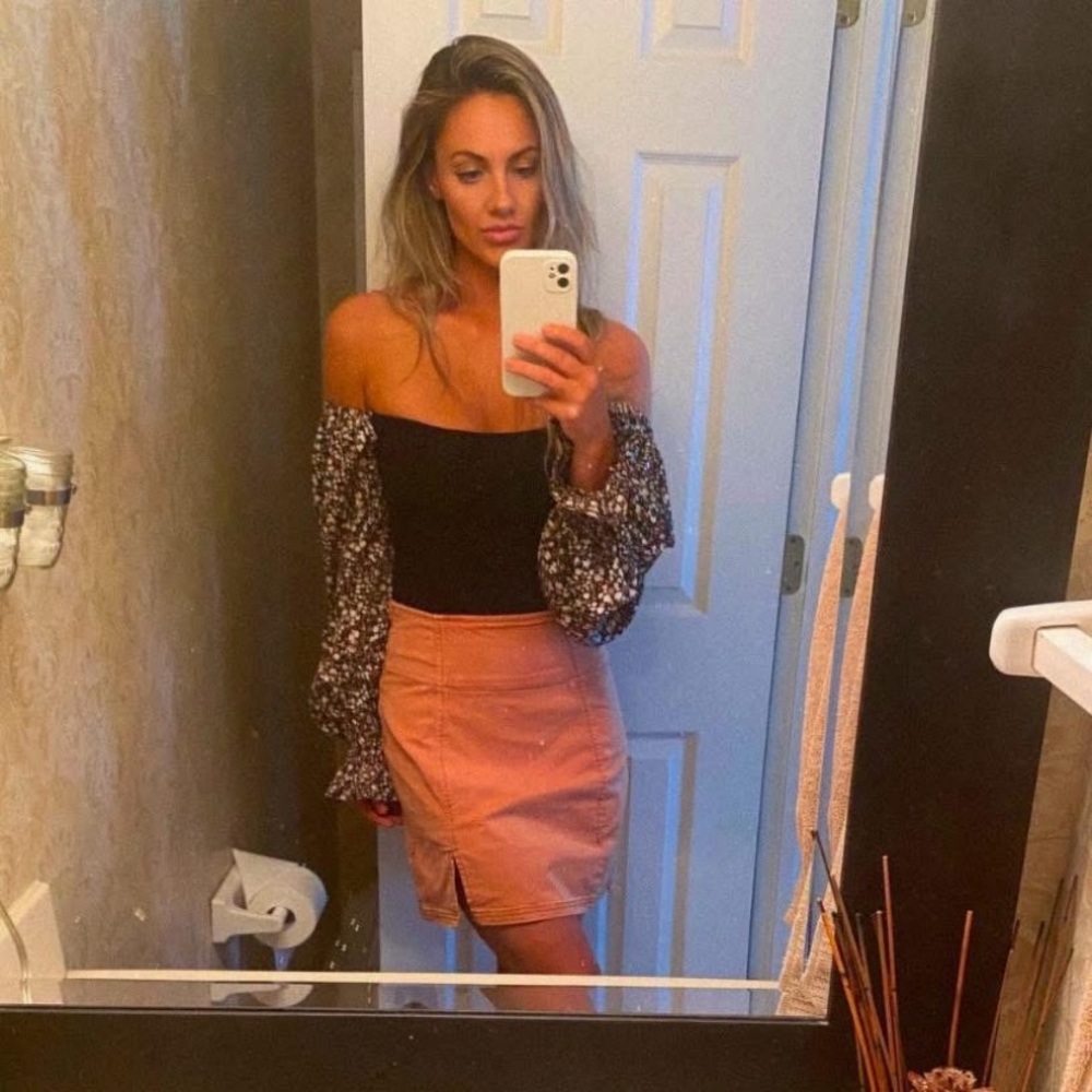 Bohme Off shoulder black bodysuit with floral sleeves